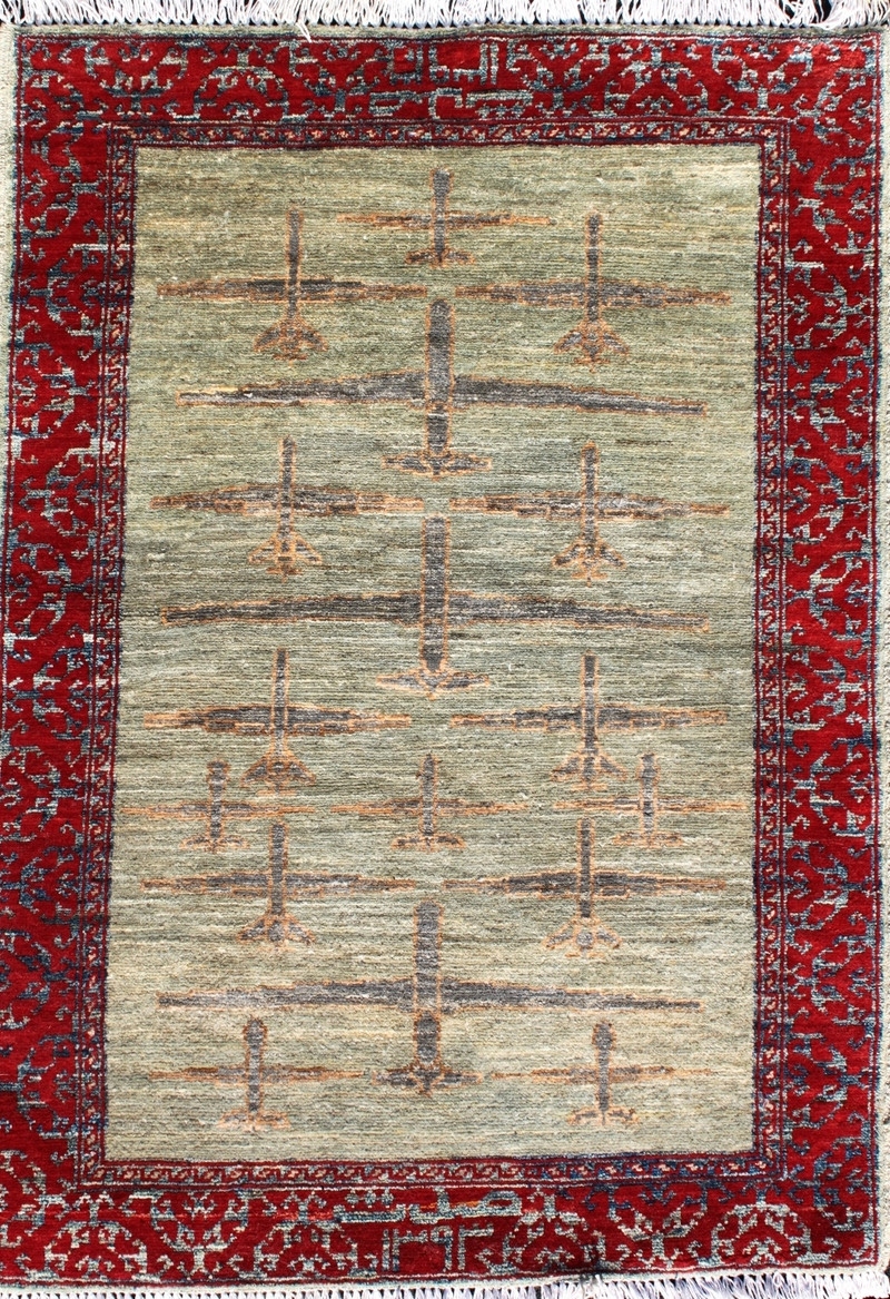 Illustration for article titled These Traditional-Style Afghani Rugs Were Inspired By Modern Warfare